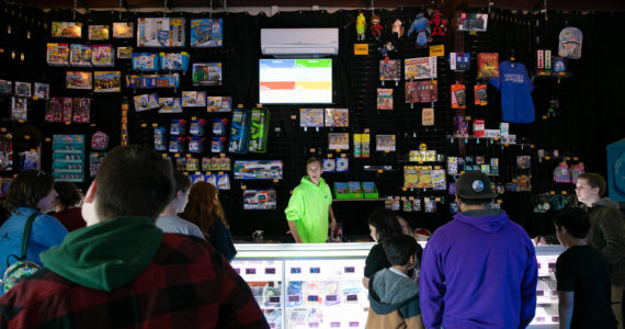 People line up to get their prizes at the arcade at the Blue Fox Drive-In Theater. (Ryan Berry / The Herald)