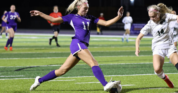 Photo by John Fisken
Oak Harbor High School junior Addison Boyer moves the ball against Mount Vernon Oct. 19 where the Wildcats won 5-1.