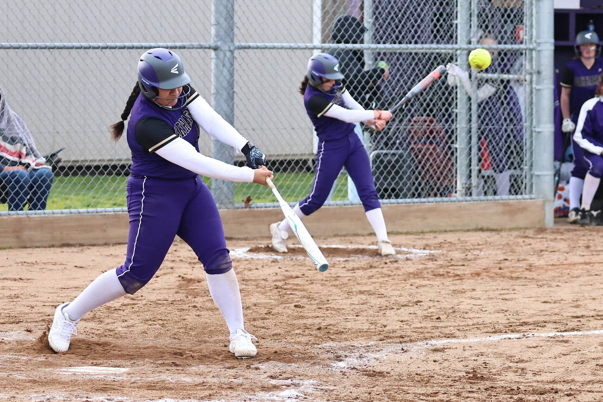 Photo by John Fisken
Oak Harbor’s Loto Tupu hits a ball during a loss against Cascade March 12. She also hit a three-run homerun March 14 during a 6-0 victory against Archbishop Murphy.