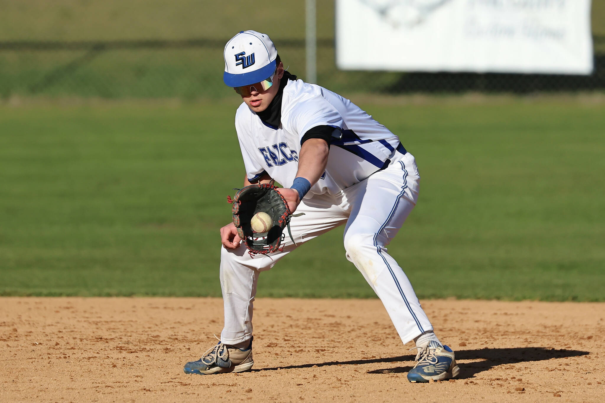 South Whidbey shortstop Grady Davis fields a ball during a game March 15 against Coupeville. South Whidbey is ranked ninth in the WIAA RPI 1A baseball poll. (Photo by John Fisken)