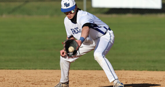South Whidbey shortstop Grady Davis fields a ball during a game March 15 against Coupeville. South Whidbey is ranked ninth in the WIAA RPI 1A baseball poll. Photo by John Fisken.
