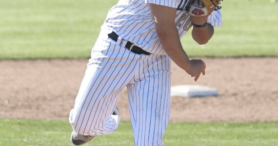 Photo by John Fisken
Oak Harbor pitcher Zachary Pyles throws during a district tournament win May 2 where the Wildcats won 3-2. Oak Harbor travels to Edmonds-Woodward Saturday.