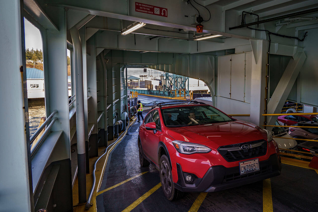 Photo by David Welton
A car drives onto the ferry. For the Mukilteo-Clinton route, vehicles dropped slightly in 2024.