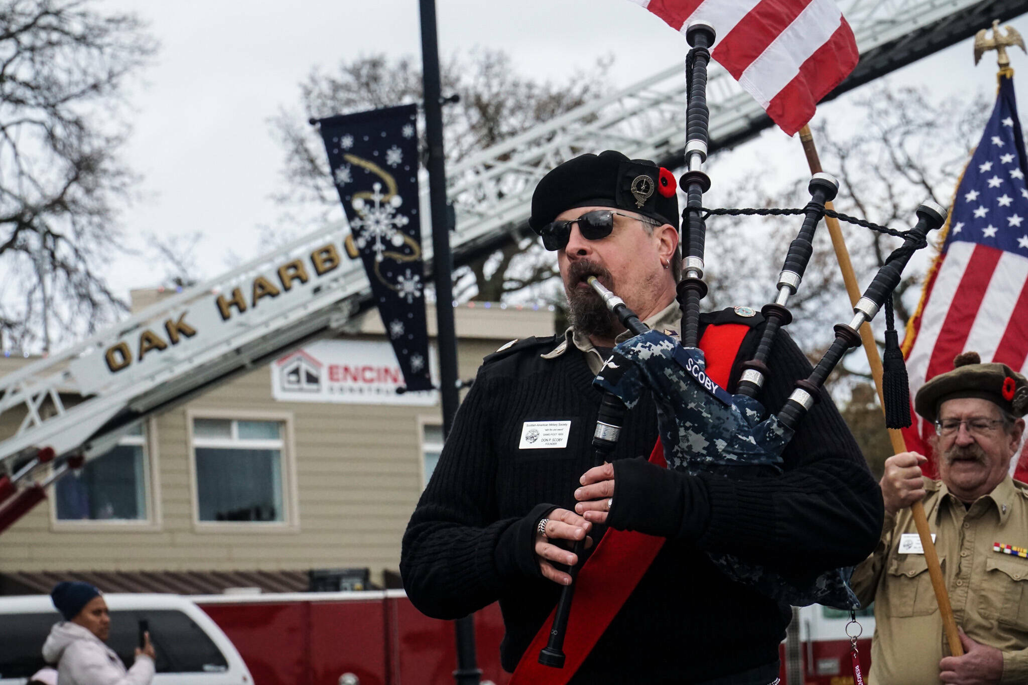 Photo by Sam Fletcher
Don Scoby, author of “The Shanty Piper” plays at the Veteran’s Day Parade in Oak Harbor.