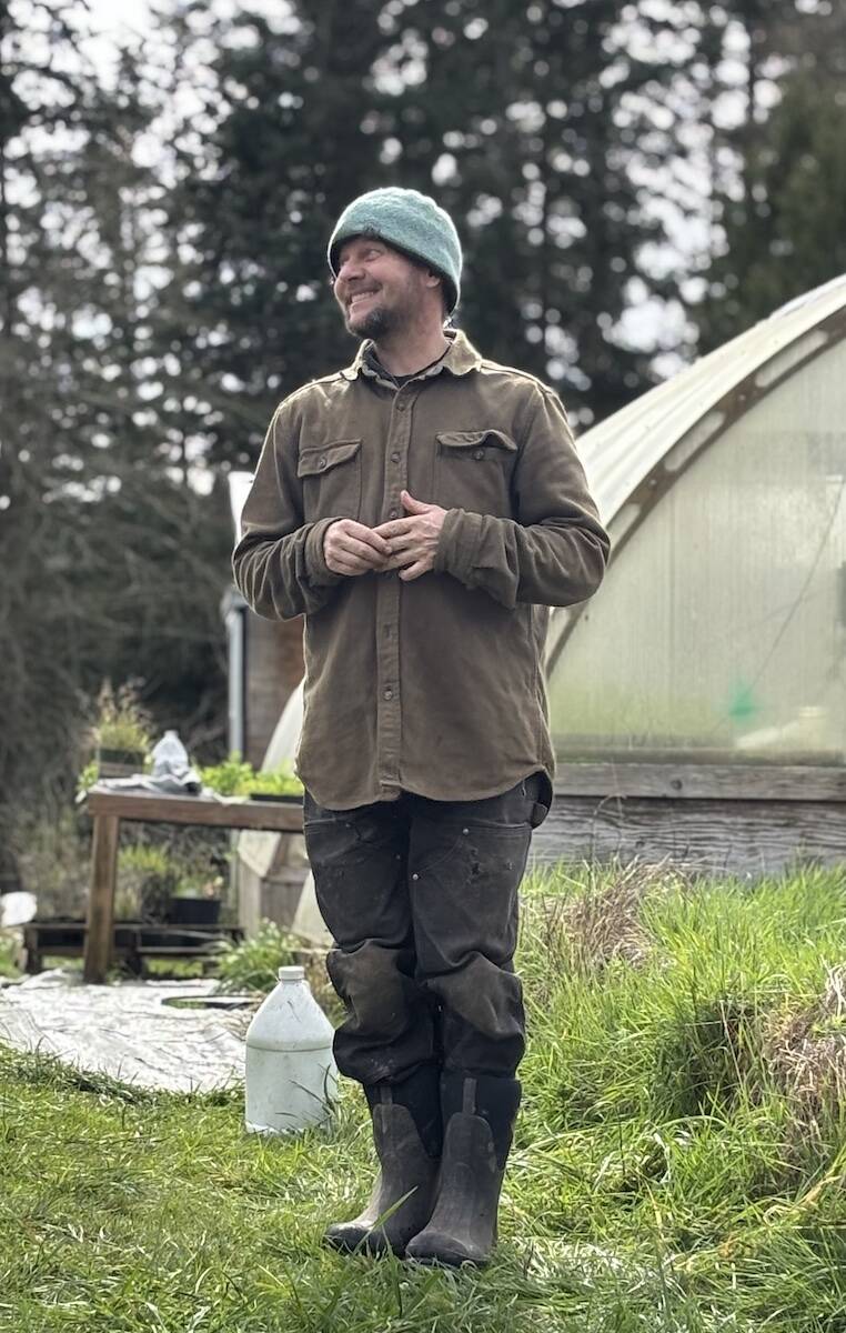Eli Wheat is the founder and owner of SkyRoot Farm. (Photo by Kate Poss)
