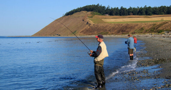 Photo by David Welton
Fishermen cast for salmon at Ebey’s Landing in Central Whidbey.