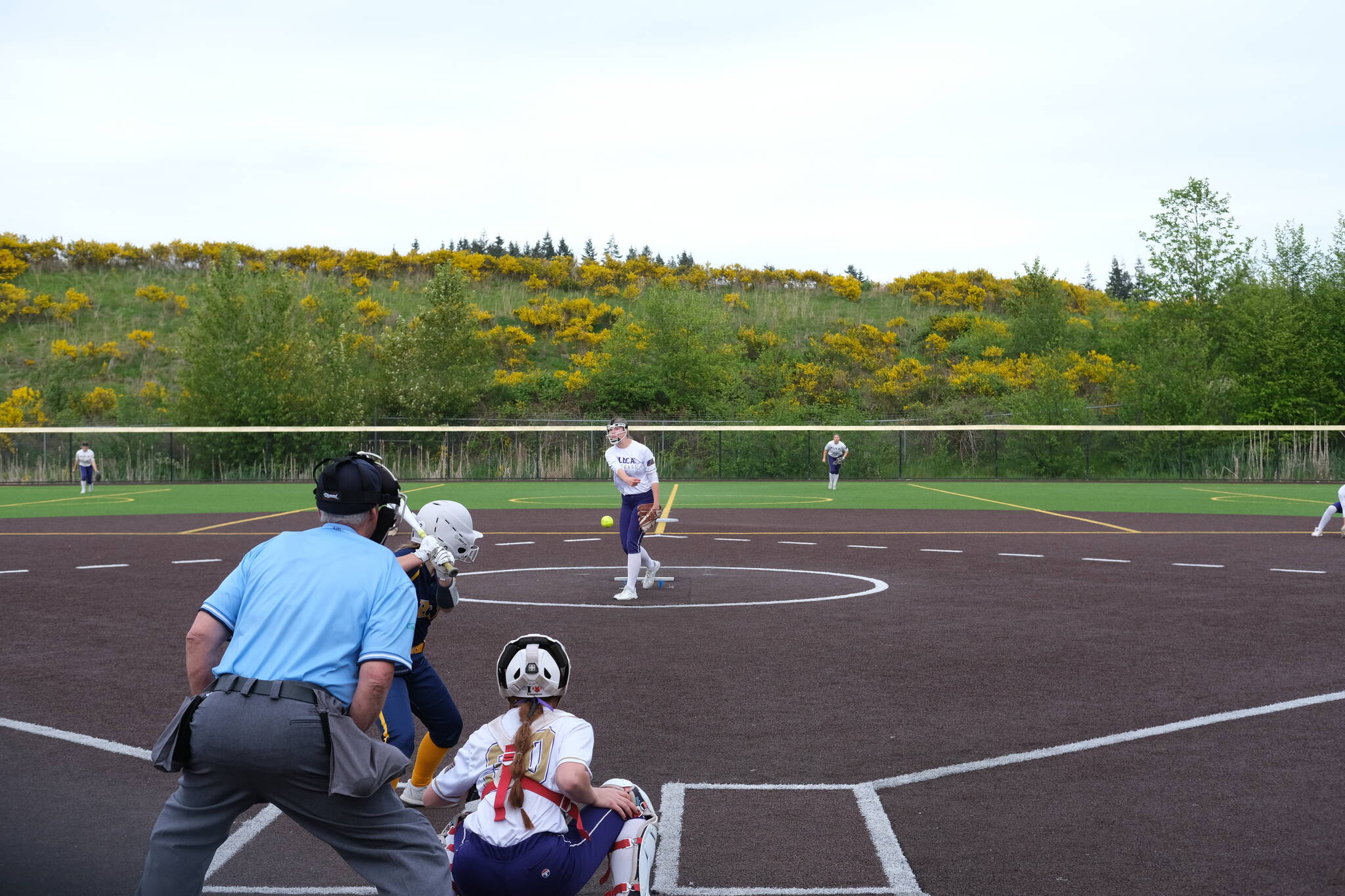 (Photo by Nathan Whalen)
Oak Harbor’s Reece Wasinger throws a pitch during a District 1, 3A softball tournament game against Everett May 9 at Phil Johnson Fields in Everett. The Wildcats lost 11-1 in a loser-out game. Oak Harbor finished its season with a conference record of 11-4 and an overall record of 13-8.