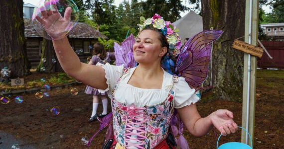 Photo by David Welton
A fairy catches a bubble during the Ren Faire last year.