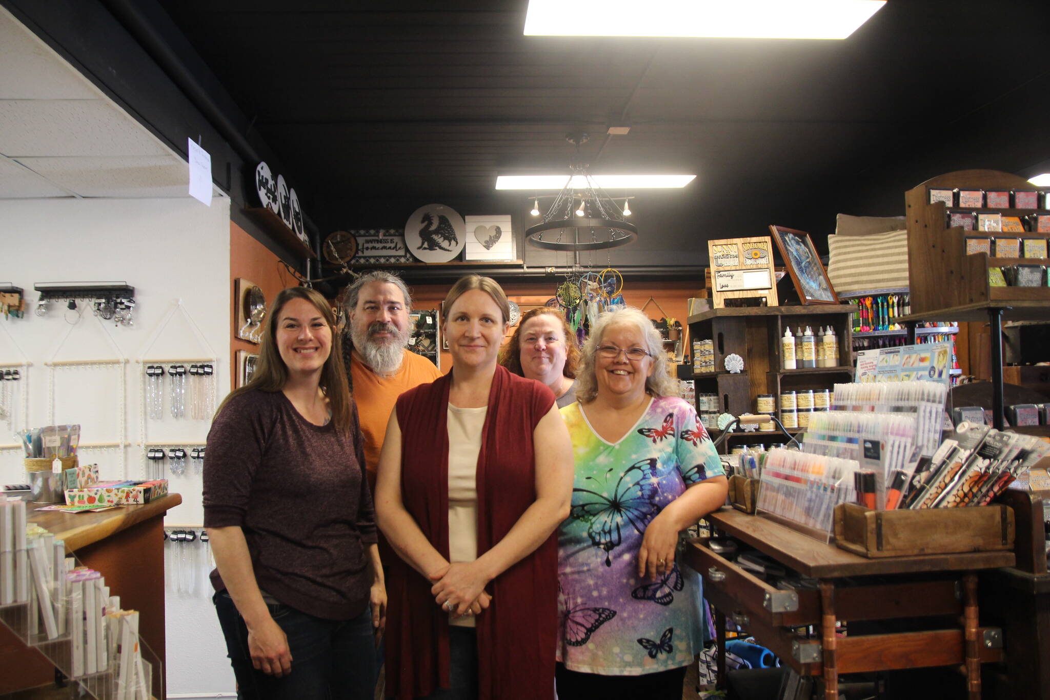 Photos by Marina Blatt
Business owner Trish Sillavan, at center, stands inside Ember and Elegance with vendors Jobeth Glenday, Tim Goette, Maria Fazio and Wendy Grimsley.