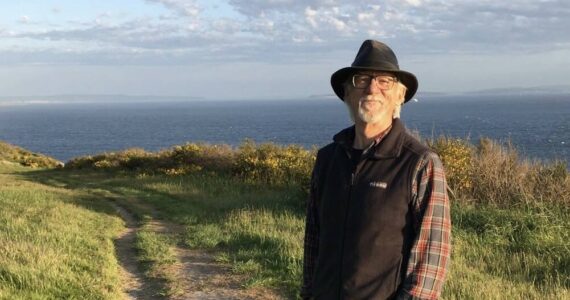 Photo provided by Kris Wilcox. Ken Wilcox takes in the view during a Fort Ebey hike in April.