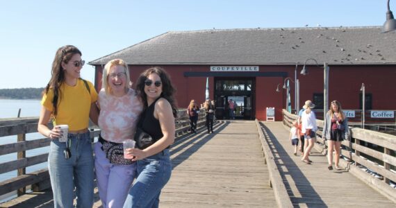 Photo by Marina Blatt
From left, Chelsea Reid, Tegan and Ellie Stewart spend a sunny day at the wharf