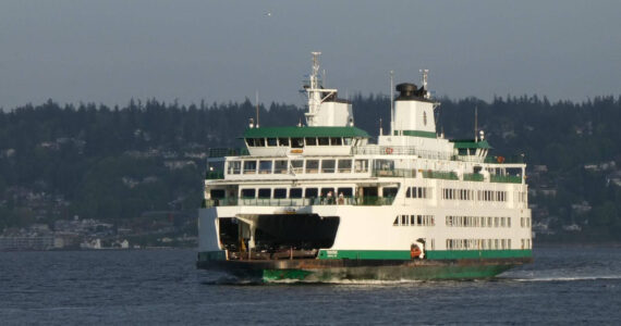 Washington State Ferries said it would deploy its new electric ferries first on the Mukilteo-Clinton run. The short route is currently served by diesel ferries like the Tokitae, seen here approaching Whidbey Island. (Photo by Tom Banse)