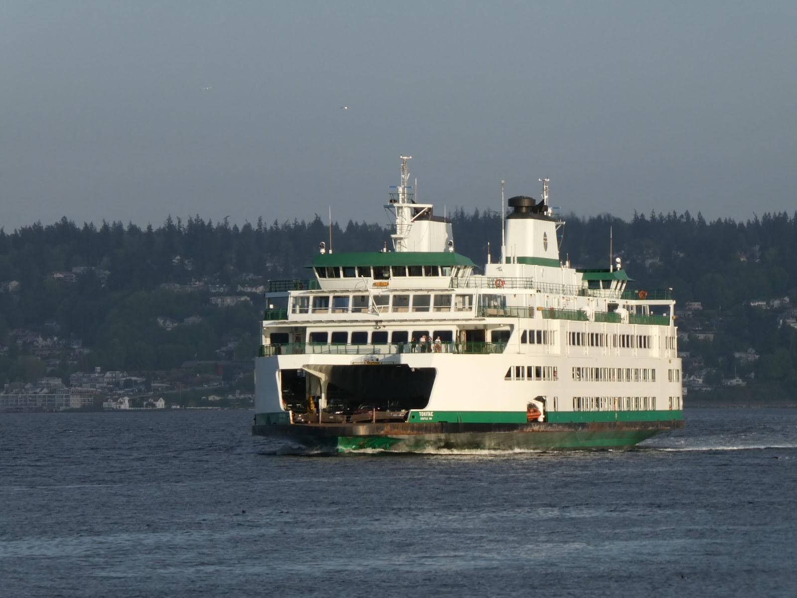 Washington State Ferries said it would deploy its new electric ferries first on the Mukilteo-Clinton run. The short route is currently served by diesel ferries like the Tokitae, seen here approaching Whidbey Island (Photo by Tom Banse)
